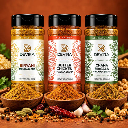 Three Devira brand masala spice blend jars displayed on a warm brown background with bowls of the ground spices and whole spices arranged in front.