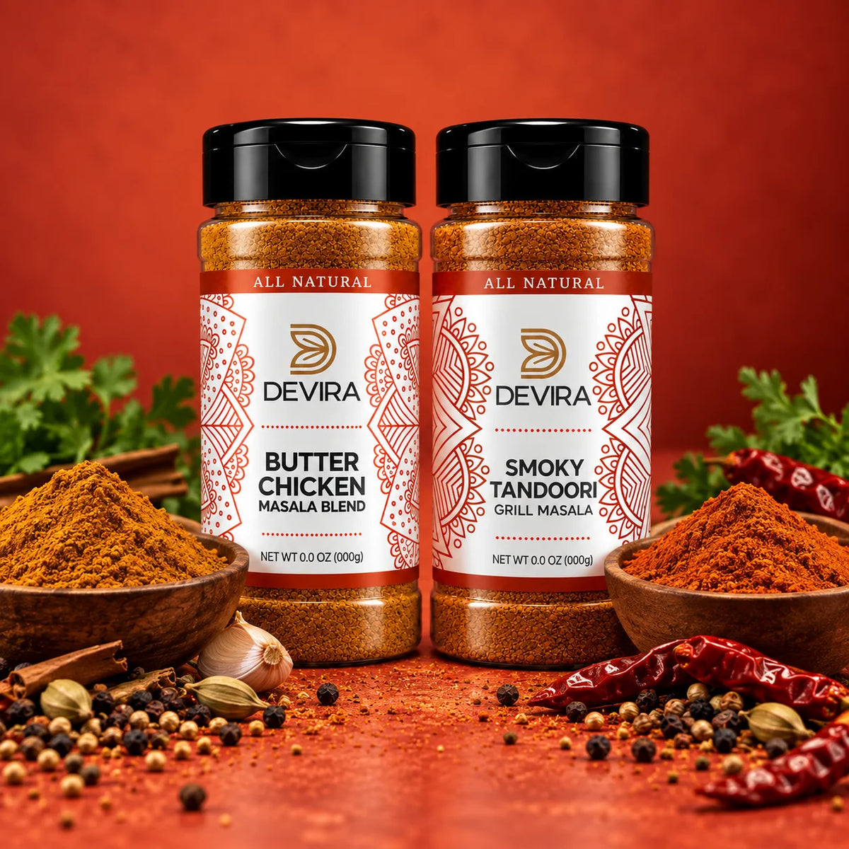 Two Devira spice blend bottles, Butter Chicken Masala Blend and Smoky Tandoori Grill Masala, displayed on a red-orange background with bowls of spices, garlic, and herbs.