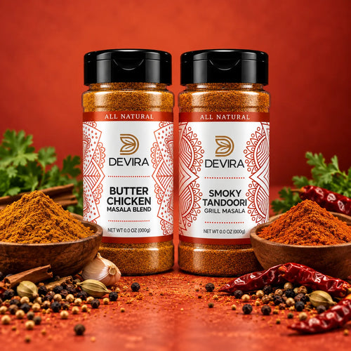 Two Devira spice blend bottles, Butter Chicken Masala Blend and Smoky Tandoori Grill Masala, displayed on a red-orange background with bowls of spices, garlic, and herbs.